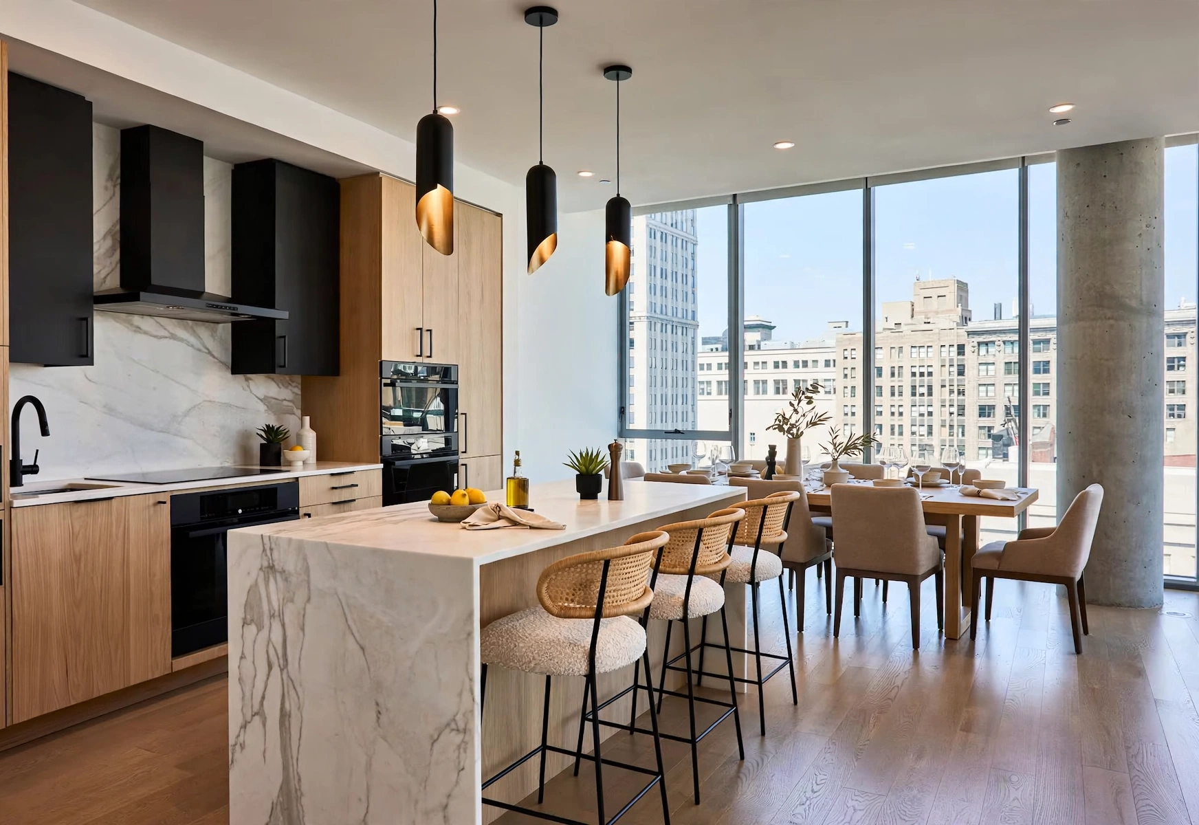Minimal kitchen with warm wood cabinetry and stone counters